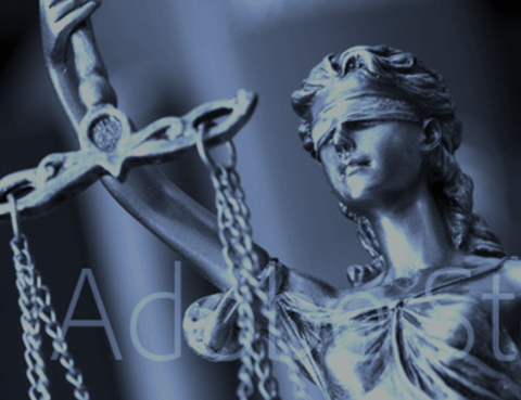 A statue of lady justice holding up a sword.